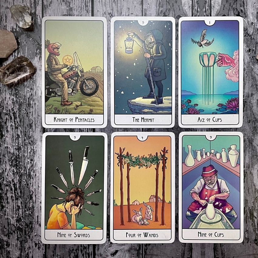 A tarot sample reading to strenghten bonds featuring the Knight of Pentacles, The Hermit, Ace of Cups, Nine of Swords, Four of Wands, and Nine of Cups.