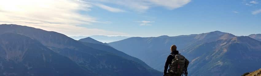 man-hiking-on-a-mountain