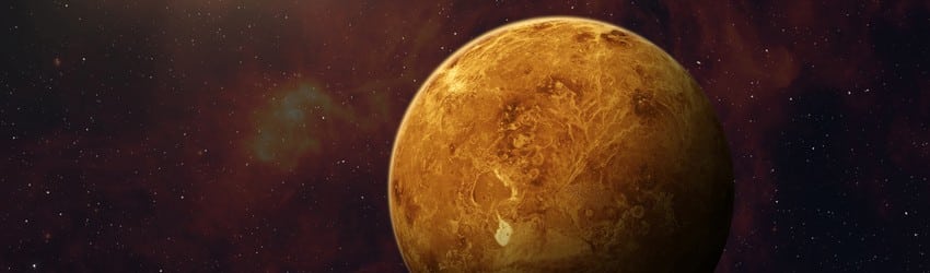 Glowing yellow venus in space.