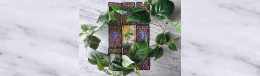 A nine-card sample Tarot spread featuring 3 rows of 3 cards.