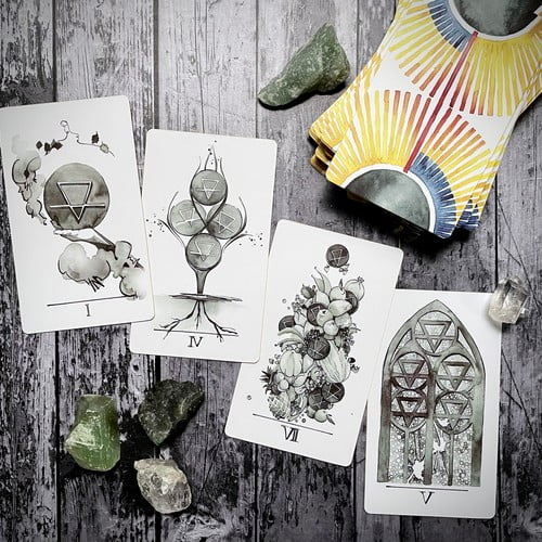 image of tarot cards spread out on a table