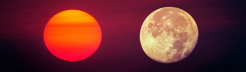 A red sun and a moon oppose each other representing the south and north node in your birth chart.