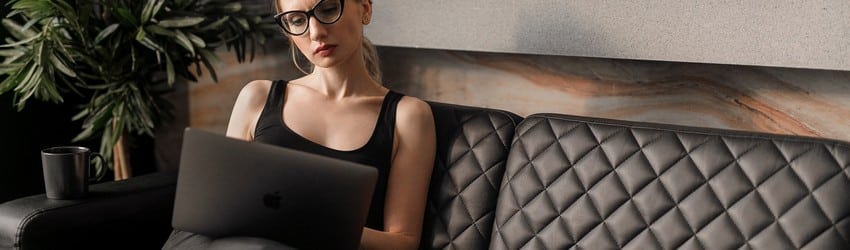 serious-looking-woman-working-on-a-laptop