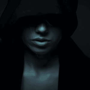 darkly light image of a hooded woman