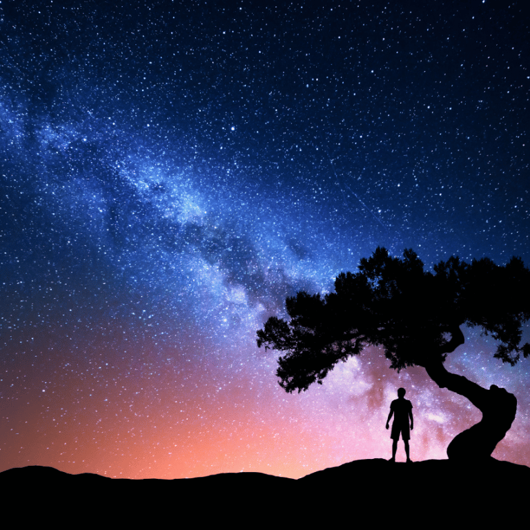 man standing under a tree in front of a pink and blue starry night