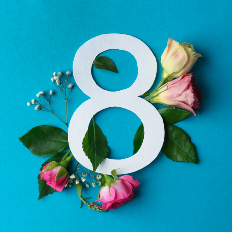 the number 8 surrounded by an array of flowers