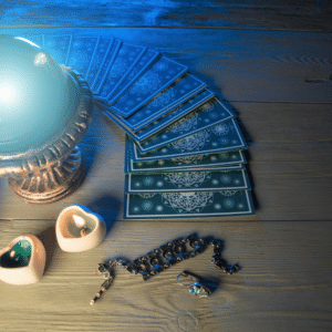 blue tarot cards spread out on a wooden table